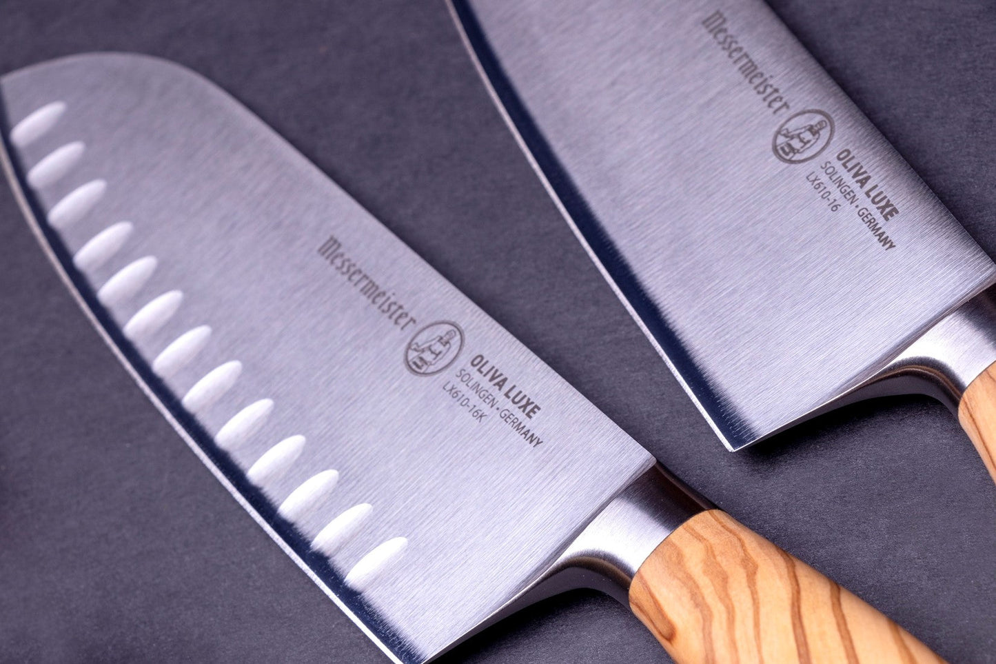 MESSERMEISTER serie OLIVA LUXE 16,5cm SANTOKU met kullenschliff en olijfhouten heft