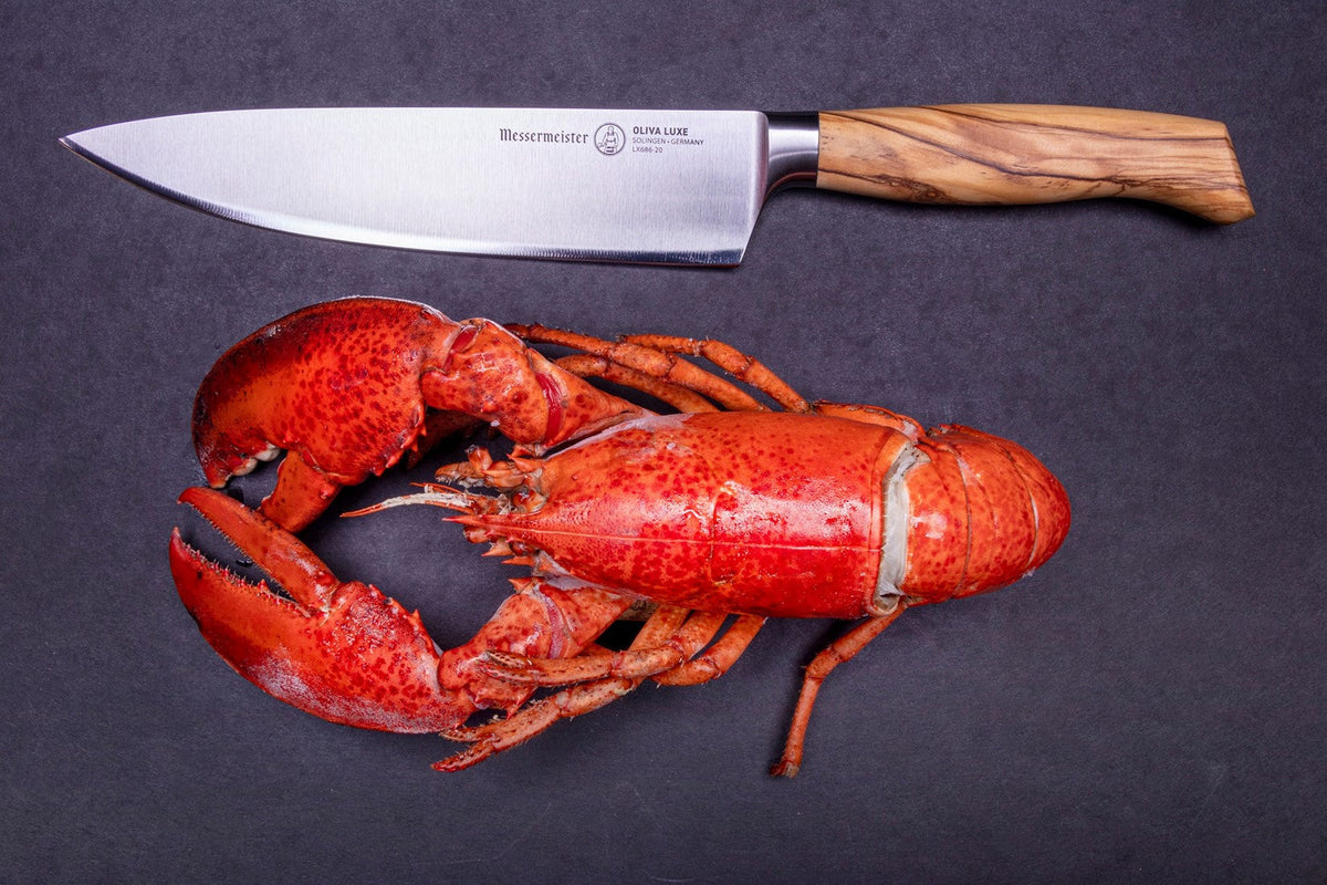 MESSERMEISTER serie OLIVA LUXE 23cm koksmes met olijfhouten heft